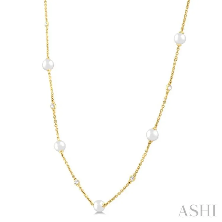 1/8 Ctw 3 MM Cultured Pearl and Round Cut Diamond Station Necklace in 14K Yellow Gold